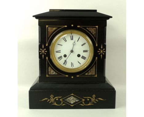 A Victorian black slate mantel clock, circa 1860, the two-train movement striking on a bell, with a circular white enamel dia