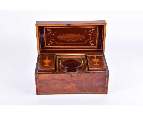 A George III flame mahogany tea caddy, early 19th century, with satinwood stringing and crossbanding, the interior with inlai