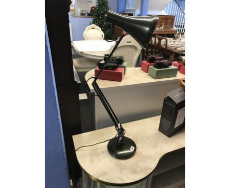 An angle poise lamp