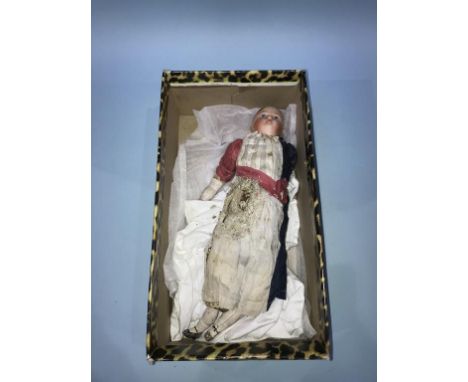 A continental bisque headed doll