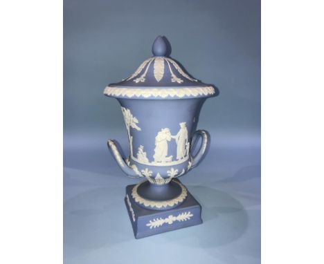 A Wedgewood blue Jasperware two handled vase and cover