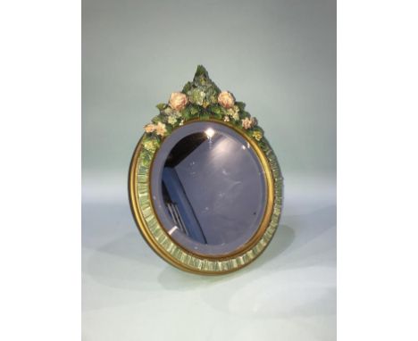 A circular Barbolla easel mirror