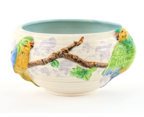 Clarice Cliff for Newport pottery bowl decorated with brightly coloured parrots in relief, printed marks to base, 21cm diam. 