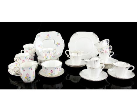 Melba Art Deco tea service, with pastel floral decoration, and a Royal Albert tea service in white ground with black and gilt