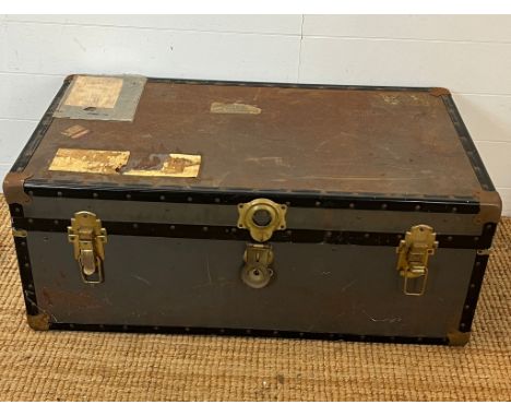 A travel trunk with brass locks (H37cm W94cm D51cm)