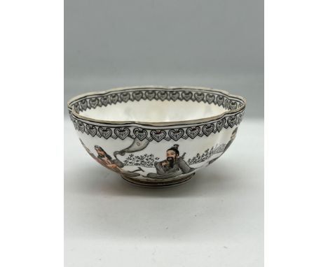 A Chinese decorated porcelain bowl with scalloped edge 