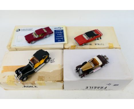 Franklin Mint - Precision Models. Four boxed Franklin Mint diecast models appearing in Excellent condition, housed in protect