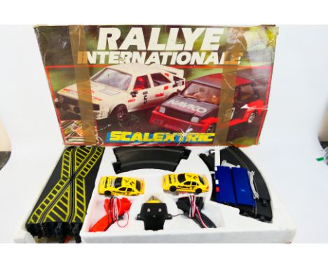 Scalextric - A boxed Rallye International set # C697. The cars in it are not the originals, they have been replaced with Merc