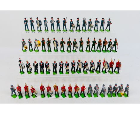 T and M Models - A collection of 60 plus painted metal marching band figures marked T and M Models on the base. They appear i