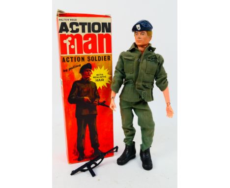 Palitoy - Action Man - A boxed vintage Action Man Action Soldier. The blonde flock haired, hard hands figure marked 'Made in 