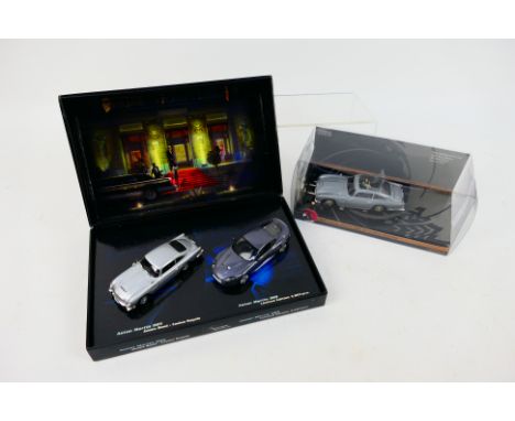 Minichamps - Corgi - 2 x boxed James Bond car sets, an Aston Martin DB5 & keyring in 1:36 scale # 2670 and a Casino Royale DB