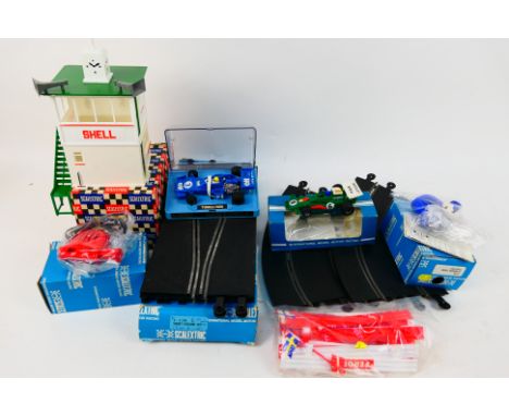 Scalextric - Two boxed vintage Scalextric slot cars with a small group of boxed and unboxed Scalextric accessories and track.