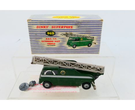 Dinky Toys - A boxed Dinky Toys #969 BBC TV Extending Mast Vehicle. The model in dark green with light grey roof and side pan