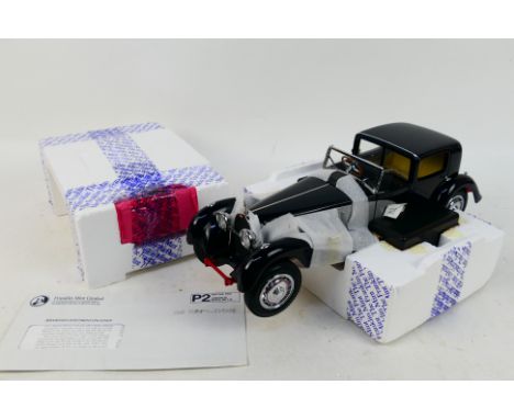 Franklin Mint - Precision Models. A boxed 1931 Bugatti Royal Coupe De Ville with paperwork, appearing in NM condition. (This 