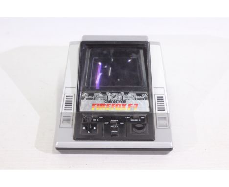 Grandstand - An unboxed Grandstand Firefox F-7 electronic hand held game - Doesn't come with batteries and shows signs of use