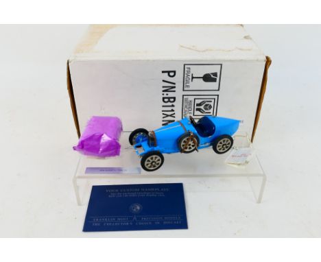 Franklin Mint - Precision Models. A boxed 1924 Bugatti Type 35 in Sky Blue, appearing in Excellent condition.  (This does not
