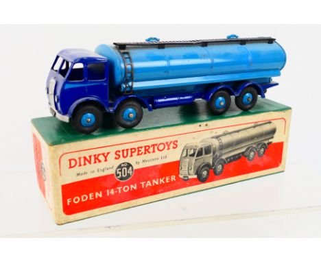 Dinky Toys - A boxed Dinky Toys #504 Foden 14-Ton Tanker (1st type) . The model with dark blue cab and chassis, light blue fl