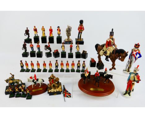 Britains - Royal Hampshire - Other - A collection of soldier models including Her Majesty The Queen & Escort, a large resin s