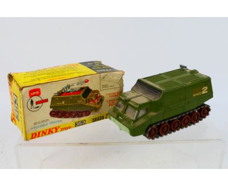 Dinky Toys - A boxed Dinky Toys #353 'UFO' Shado 2 Mobile. The model in green with green roof, brown rollers, silver tracks, 