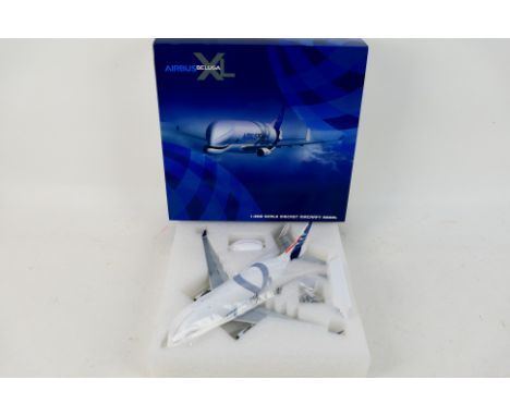 JC Wings - A boxed Airbus A330-743L Beluga XL in 1:200 scale # LH2227. The model appears Mint in a Very Good box. (This does 