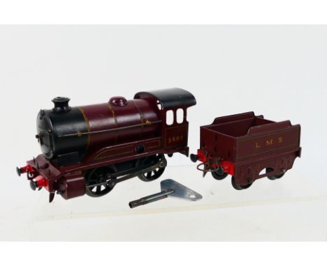 Hornby - An unboxed Hornby O gauge Type 501 clockwork 0-4-0 steam locomotive and tender Op.No. 5600 in LMS maroon livery. The