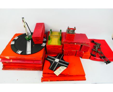 Hornby - A boxed group of Hornby O gauge 2-rail track, and track accessories. Lot includes PL1 Clockwork Points; CA2 Acute An