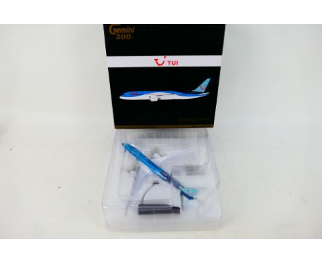 Gemini Jets - A boxed Boeing 787-9 in TUI livery in 1:200 scale # G2TOM908. The model appears Mint in a Very Good box. (This 