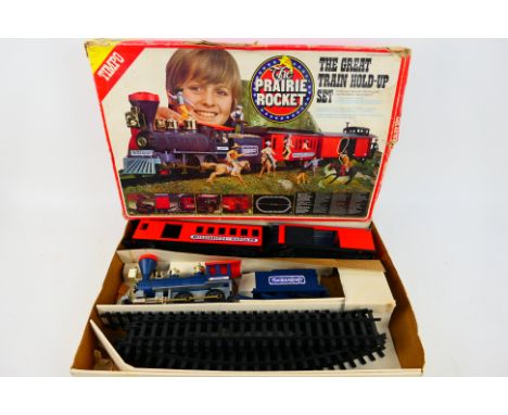 Timpo - A boxed Timpo 'The Prairie Rocket - The Great Train Hold-Up Set'. The set comes with locomotive and tender, plus two 