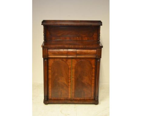 An early 19th century mahogany chiffonier, shelf to back supported on columns, drawer and cupboards under - H110cm, W76cm, D3