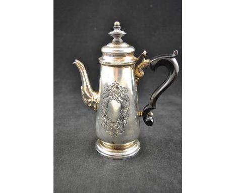 A continental silver coffee/chocolate pot, ebony handle, domed lid with ebony finial, vacant cartouche, H18cm - approx total 