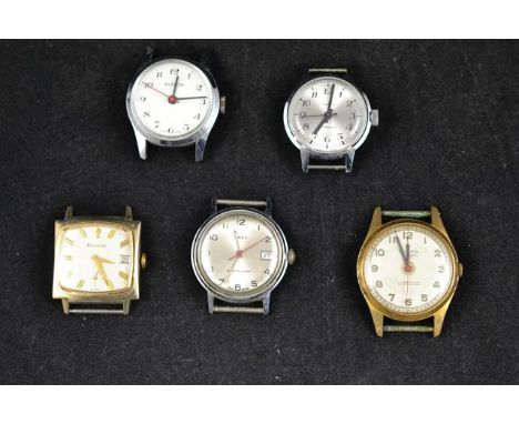 A collection of five vintage watch heads - Avalon, Bulova, Rytima, Ruhla and Timex.