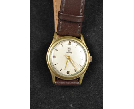 A gentleman's vintage Tudor wristwatch in gilt and stainless steel case, dial with baton numerals and arabic numerals to the 