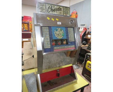 A VINTAGE CRESTA THREE REEL ONE ARM BANDIT, with light up sign above, H 84 cm, W 45 cm, D 33 cm 