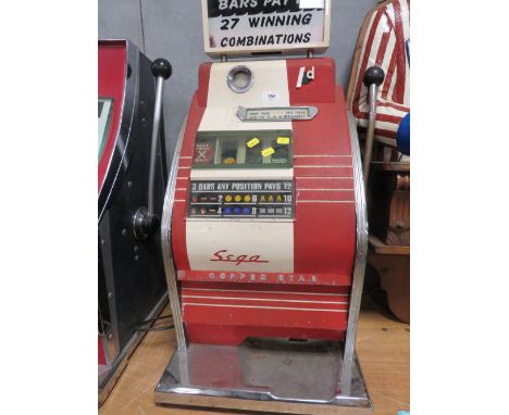 A VINTAGE 'COOPER STAR' ONE ARMED BANDIT, three reel machine, with spare mechanism, with light box to top, H 81 cm 