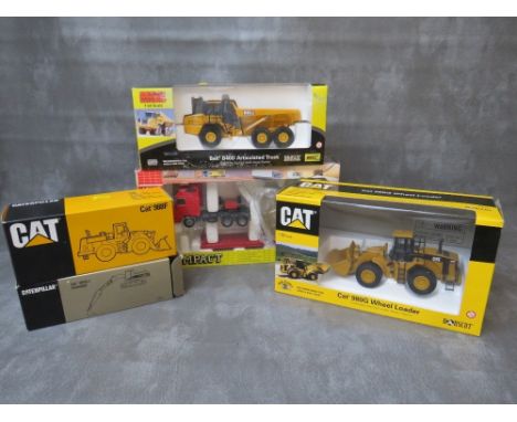 FIVE BOXED DIE CAST VEHICLES, to include 1:50 scale CAT 980G wheel loader, 1:50 scale Bell B40D articulated truck, 1:50 scale