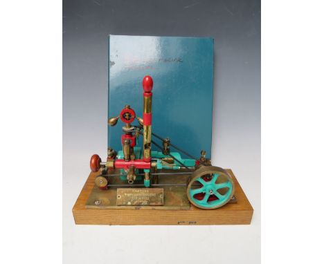 A POPCORN ENGINE ON WOODEN PLINTH, with build instructions / plans 
