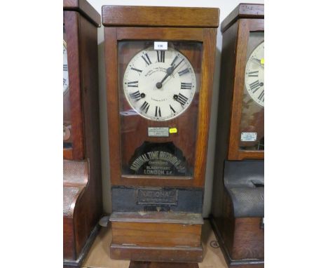 A NATIONAL TIME RECORDER OAK CASED CLOCKING IN CLOCK, H 84 cm 