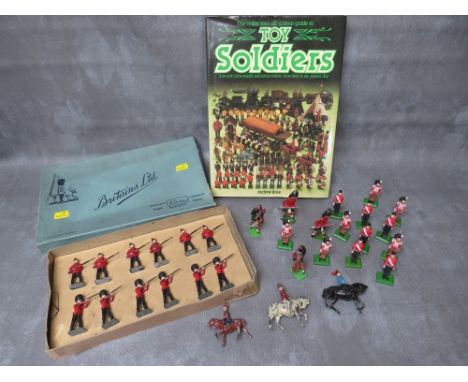 A BOXED SET OF TWELVE BRITAINS LEAD SOLDIERS, footguards and infantry of the line set 5A, together with nineteen other mixed 