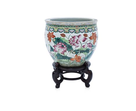 A FAMILLE ROSE PORCELAIN LOTUS POND JARDNIERE Decorated with birds and lotus flowers in a continuous scene, between multiple 
