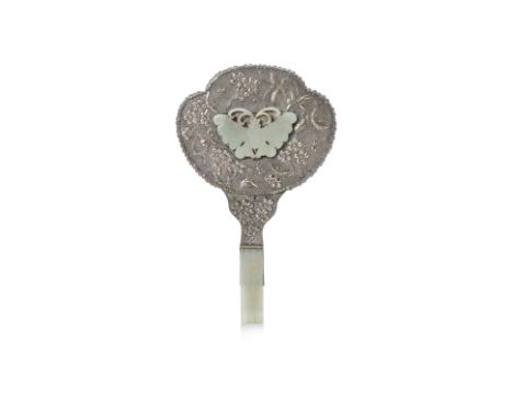 A CELADON JADE-MOUNTED SILVER-PLATED HAND MIRROR
The silver plated mounts chased with butterflies amongst flowering branches 