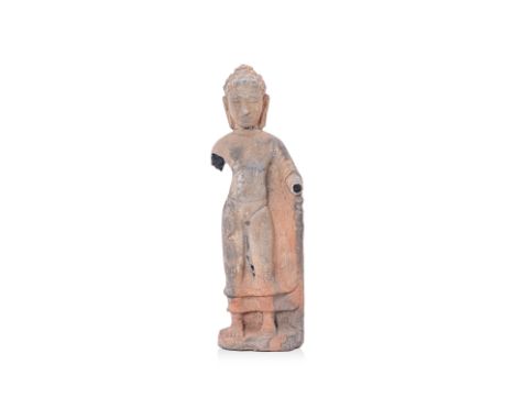A CAMBODIAN STANDING BUDDHA FIGURE
Khmer, Takeo Pre-Angkor type, large head, closed eyes, stretched earlobes, conical rosette