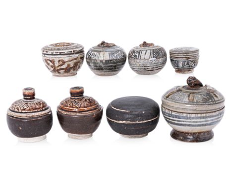 AN ASSORTMENT OF EIGHT THAI LIDDED BOXES
Circa 15th Century and later, bulbous form, duck with neck turned back as finial, ir