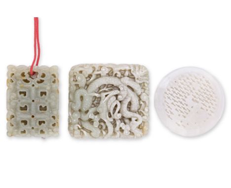 A GROUP OF THREE JADE PLAQUES / PENDANTS
One rectangular example with archaic scrolls; one circular example with pierced deco