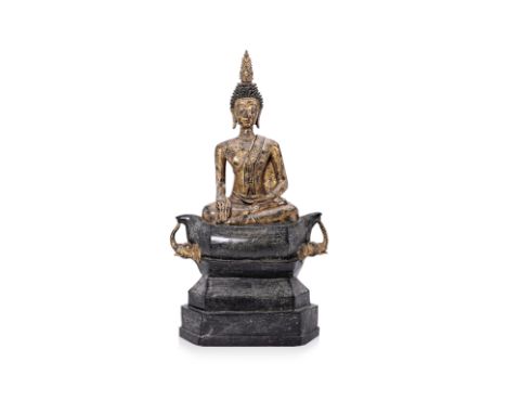 A LARGE GILT LACQUERED BRONZE BUDDHA Probably Laos, modelled seated in Bhumisparsa mudra, with the left palm facing upwards a