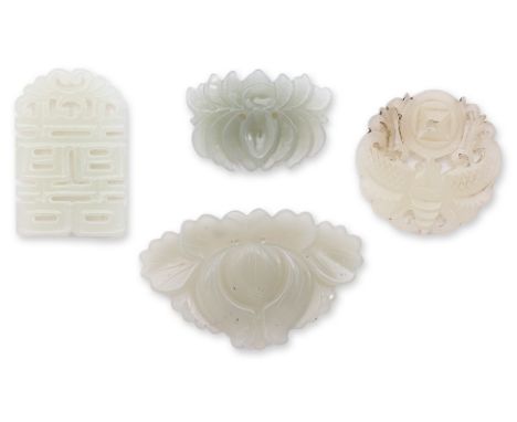 A GROUP OF FOUR SMALL JADE CARVINGS
Comprising: two foliate examples in the form of lotus; one pierced disc shaped example fe