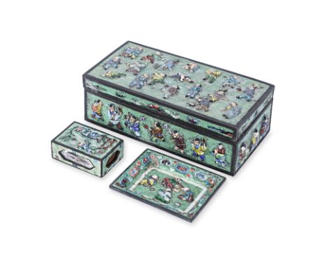 A CHINESE ENAMEL CIGARETTE BOX; ASHTRAY AND MATCHBOX HOLDER
Early 20th C., all similarly decorated in relief and coloured ena