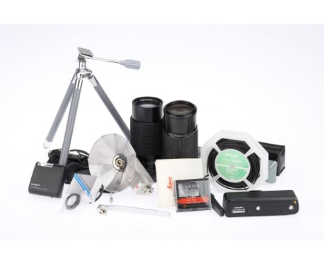 A Mixed Selection of Camera Accessories, to include a Leica R 8 focussing screen, a Hasselblad Eyepiece marked '0D 90', a ver