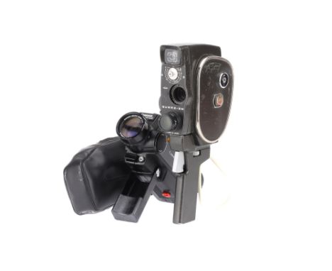 A Canon Auto Zoom 318M Super 8 Motion Picture Camera, black, body G, slightly stick handle, motor works when batteries are in