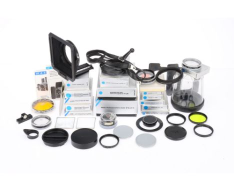 A Selection of Hasselblad Camera Accessories, including 40676 Professional Lens Shade, filters, straps and more Note: In the 