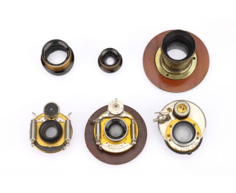 A Selection of Early 20th Century Brass Lenses comprising six lenses; a Wollensak Extra Rapid-Rectilinear f/8 lens in a Gundl